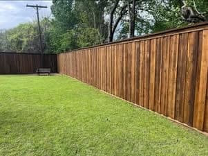 Facebook project photo showing finished sod beside a long fence line