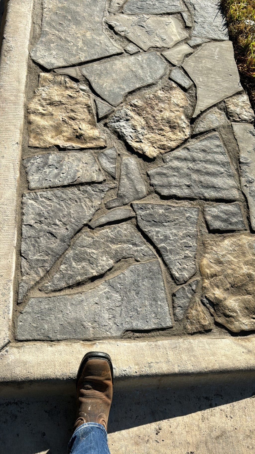 Detailed flagstone hardscape installation for a durable outdoor surface